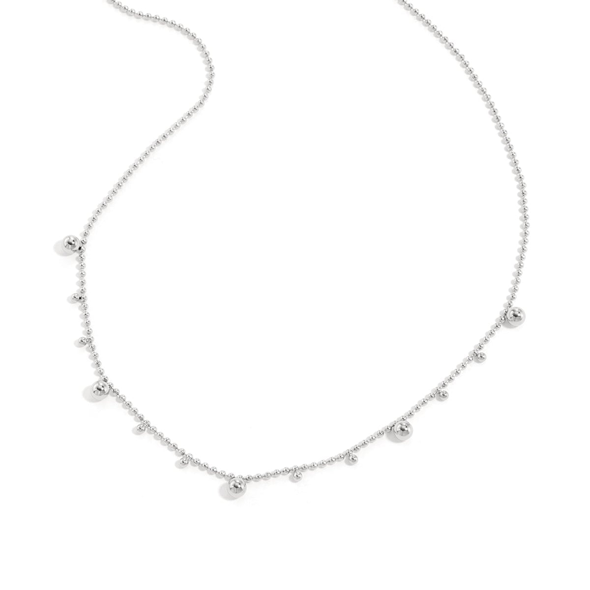 Necklace with alternating balls