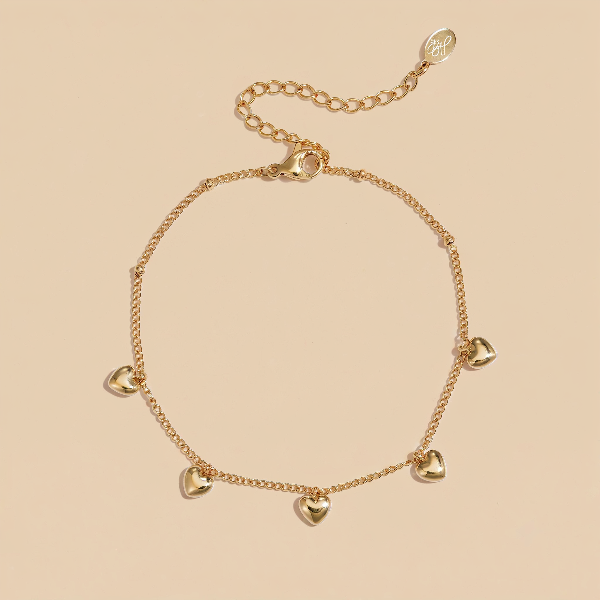 The Charm Row Bracelet | Gold Dangling Heart Chain Bracelet