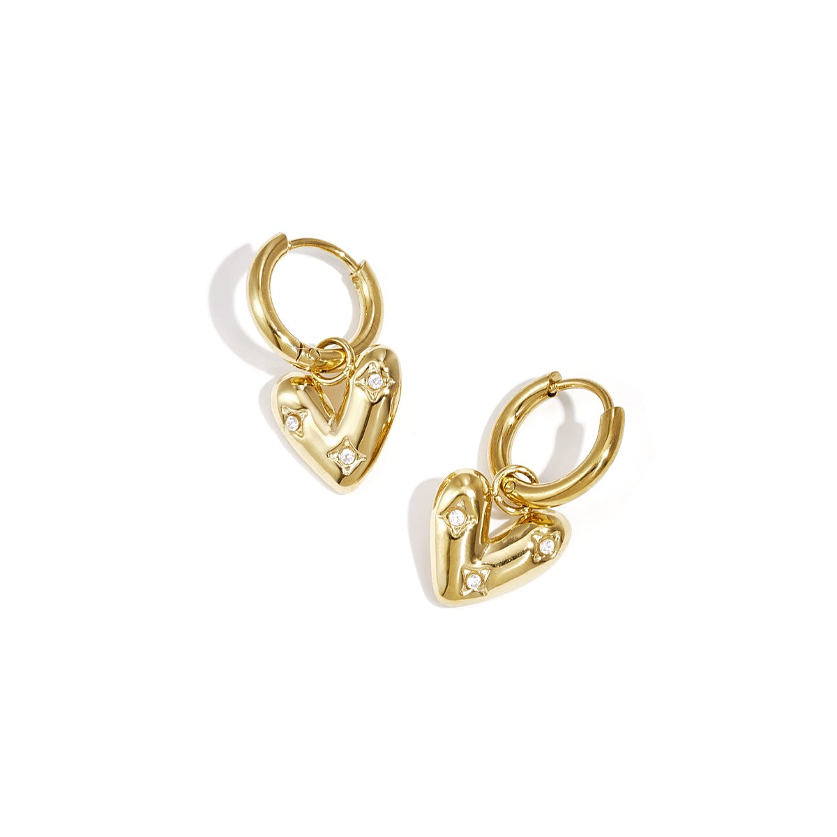 Earrings with heart shaped pendant and zircon